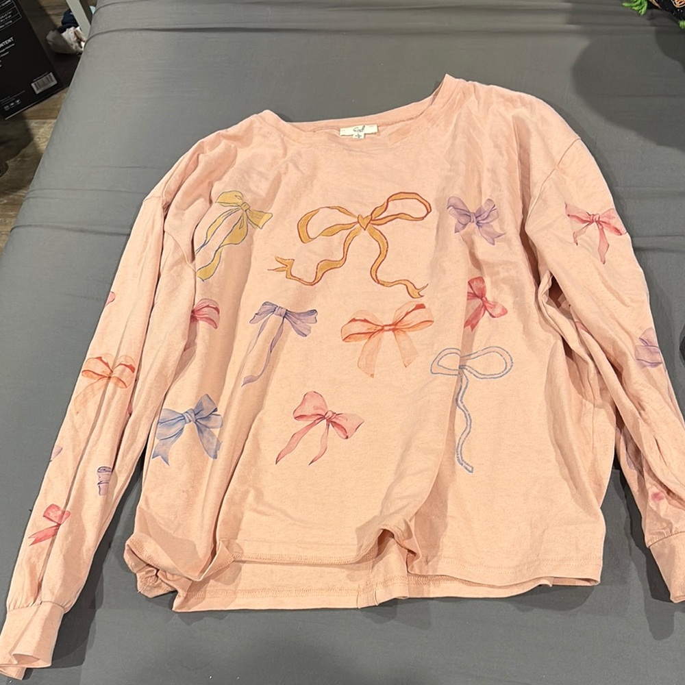 Pink Sweatshirt with Colorful Bow Designs